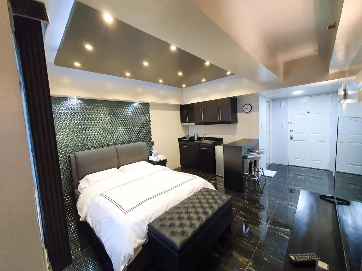 מנילה Burgundy Mckinley Place Service Apartment מראה חיצוני תמונה